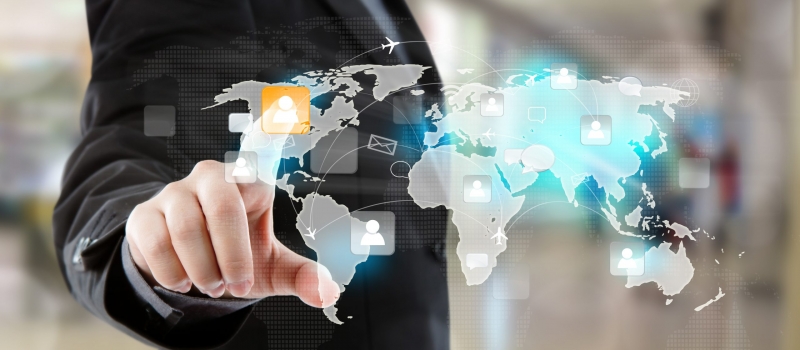 Social Network concept : Business man point to social network and world map